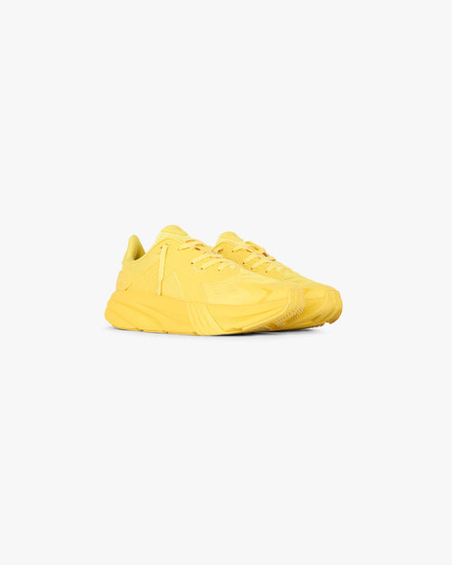 Side product image of a mens yellow running shoe on a plain white background | 247 Arc 1 Runner in Yellow | Performance engineered running footwear | 247 Footwear | Represent Clo