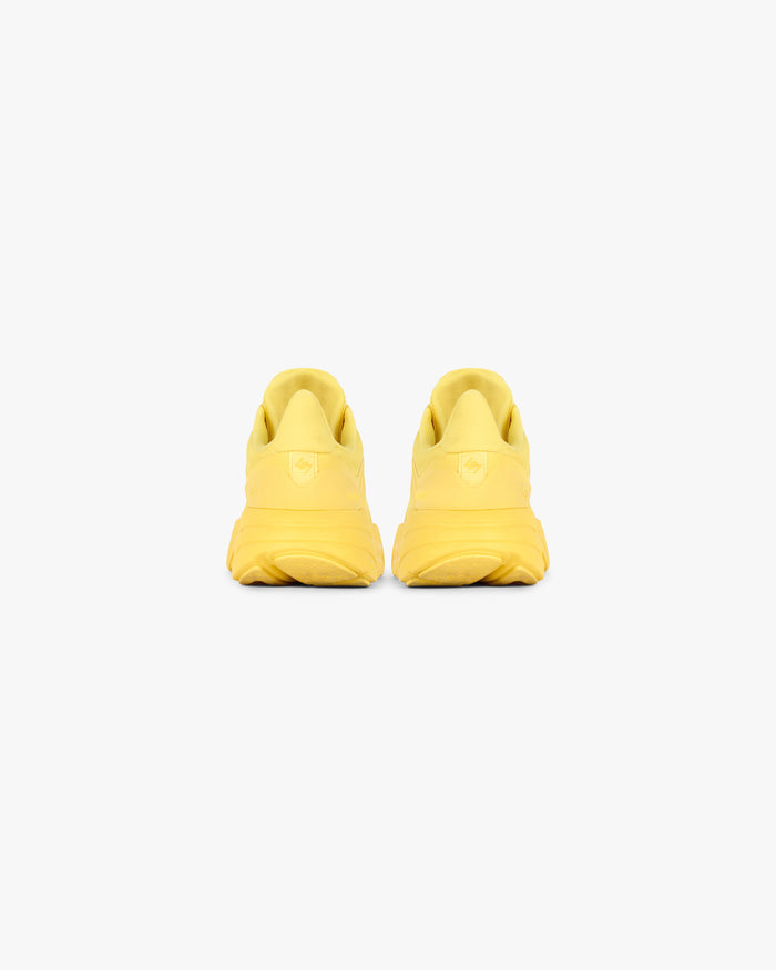 Product image of a mens yellow running shoe on a plain white background | 247 Arc-1 Runner in Yellow | Running shoe with breathable mesh upper | 247 Footwear | Represent Clo