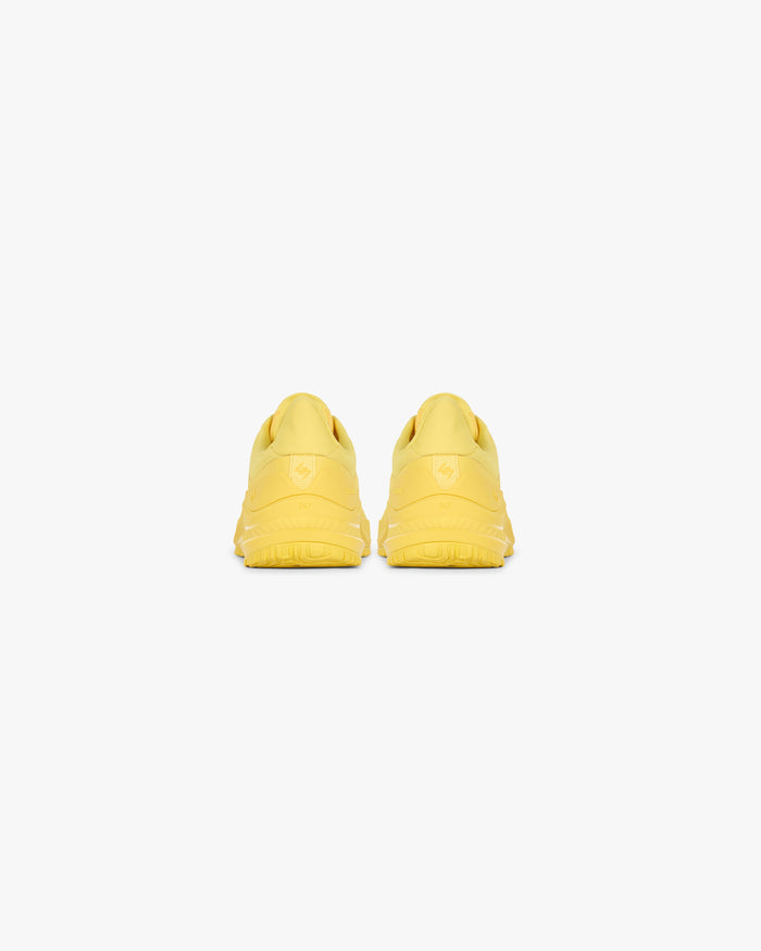 Product image of a mens yellow trainer on a plain white background | 247 Arc-2 Trainer in Yellow | Trainer with engineered knitted upper and TPU overlays | 247 Footwear | Represent Clo