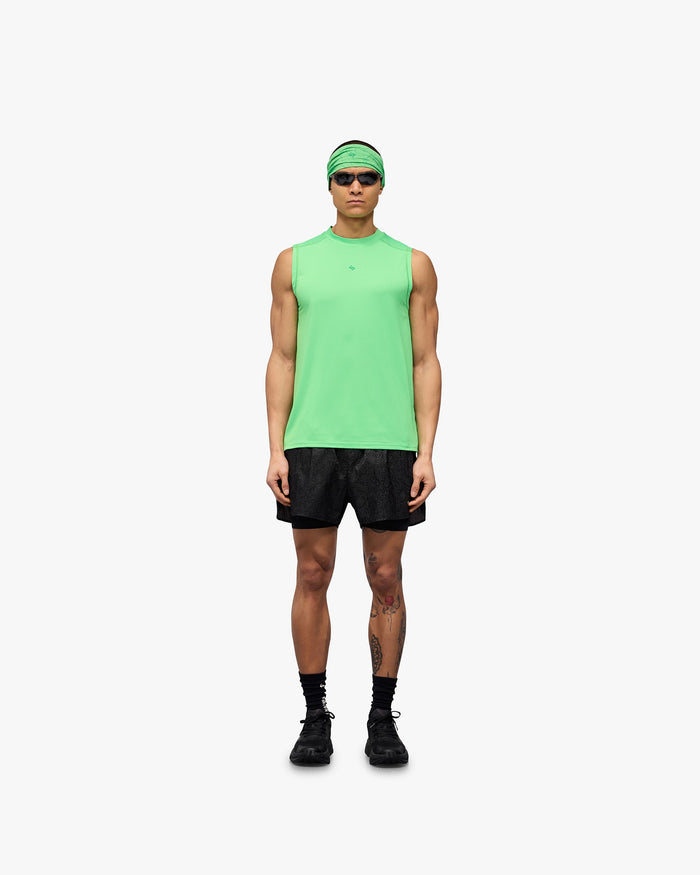 Man wearing a green running tank on a plain white background | 247 Contour Run Tank in Speed Green | Breathable sweat-wicking running tank | 247 T-Shirts | Represent Clo