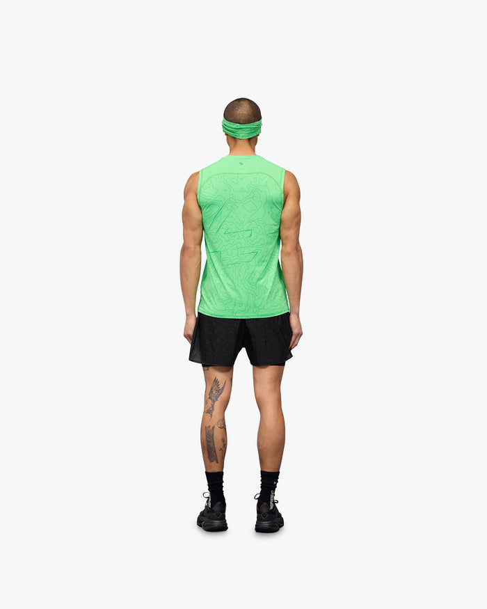 Man wearing a green running tank top on a plain white background | 247 Contour Run Tank in Speed Green | Breathable mesh running tank | 247 T-Shirts | Represent Clo