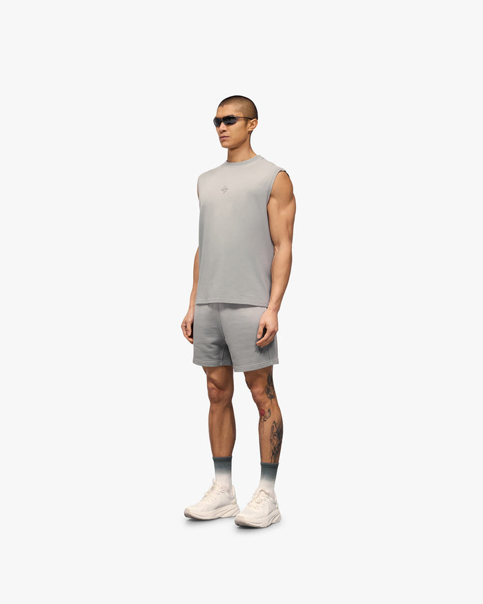 Man wearing grey jersey shorts on a plain white background | 247 Motion Shorts in Titanium | Shorts with elasticated waistband | 247 Shorts | Represent Clo