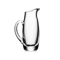 Clear glass pitcher with curved handle and tapered pouring spout on white background.
