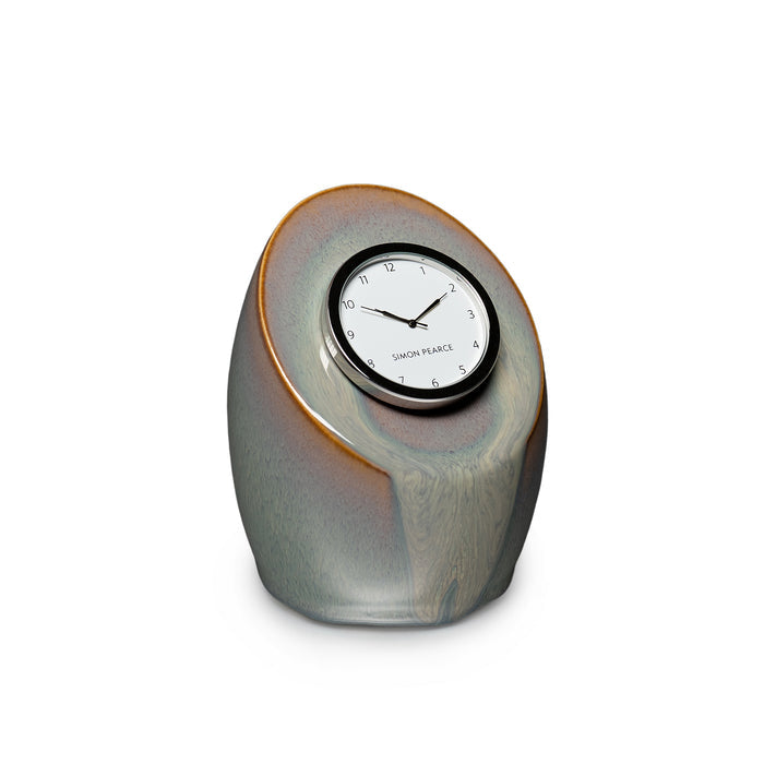 Gray pottery clock with rounded oval shape and embedded black clock face showing time.