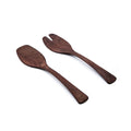 Pair of dark brown wooden salad servers with flat spoon and fork heads on long handles.