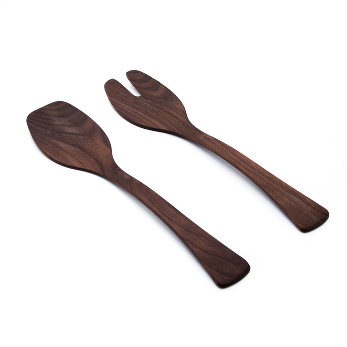 Pair of dark brown wooden salad servers with wide, flat heads and tapered handles.