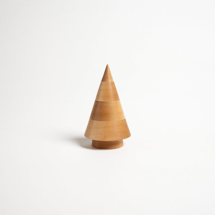 Wooden cone-shaped evergreen figurine in natural maple wood with a cylindrical base on white background.