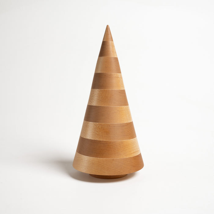 Tall wooden cone with horizontal bands in varying shades of natural maple wood grain.