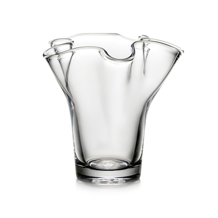 Clear glass vase with fluted sides and wavy rim opening.