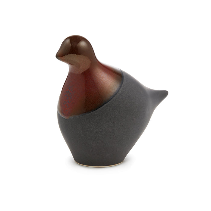 Brown and charcoal ceramic dove figurine with glossy finish and curved body shape.