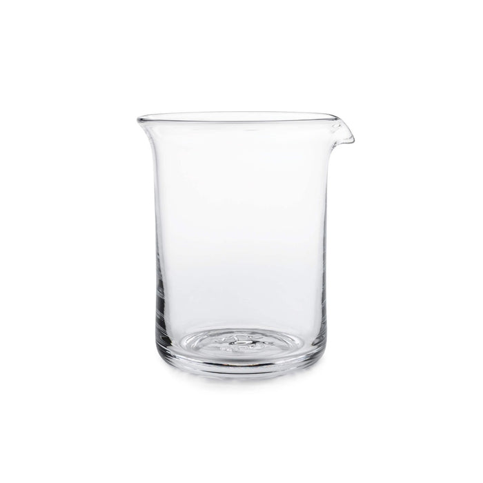 Clear glass bar pitcher with a pouring spout and straight cylindrical sides.