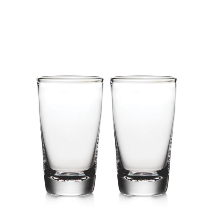 Two clear pint glasses with thick bases side by side.