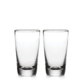 Two clear pint glasses with thick bases side by side.