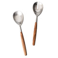 Two stainless steel serving utensils with wooden handles: one solid spoon and one slotted spoon.
