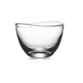 Small clear glass bowl with curved wavy rim and rounded bottom.
