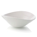 White ceramic serving bowl with curved sides and a pouring spout on one end.