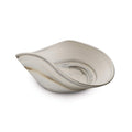 Cream-colored ceramic bowl with curved shell-like shape and subtle gray striations throughout.