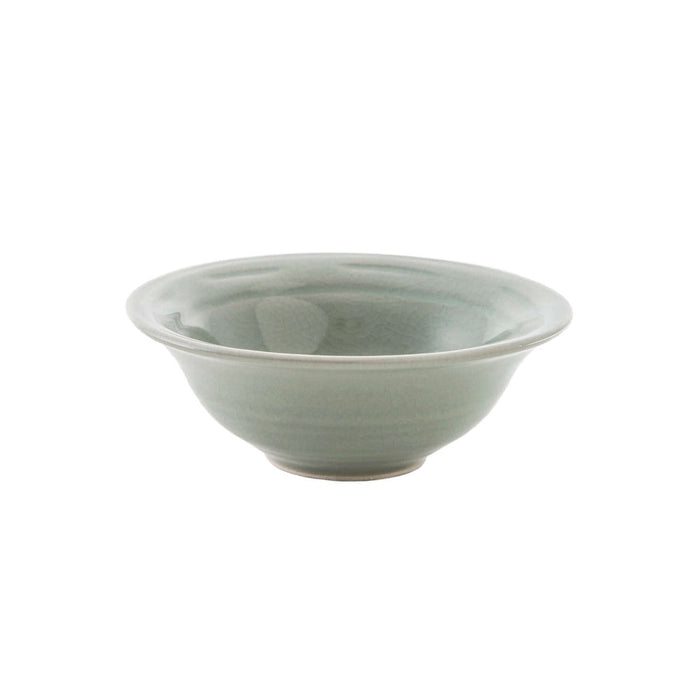 Celadon ceramic cereal bowl with crackle glaze finish and wide rim.
