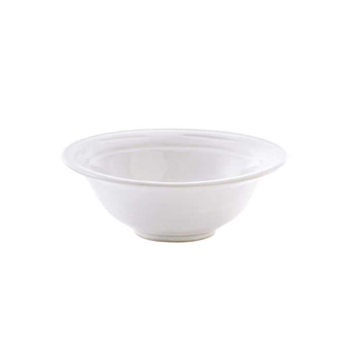 White ceramic cereal bowl with wide rim and curved sides.