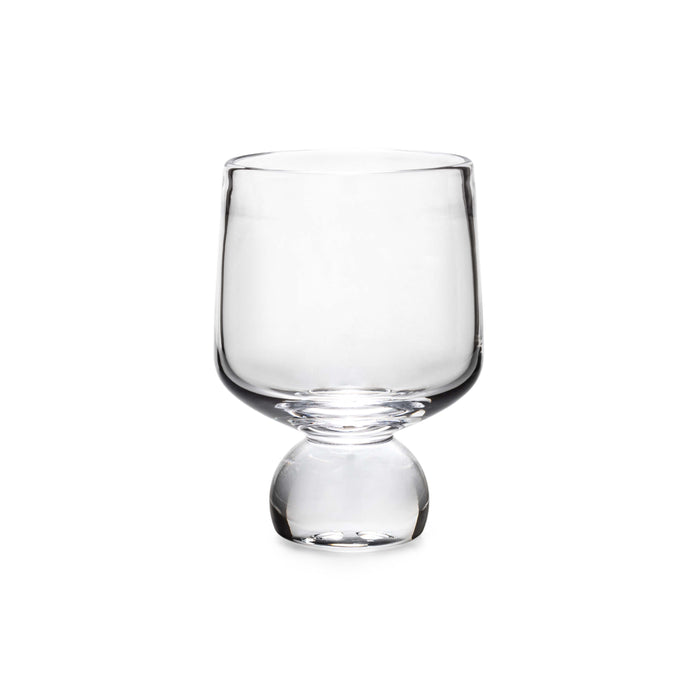 Clear glass tumbler with rounded bowl shape and bulbous pedestal base.