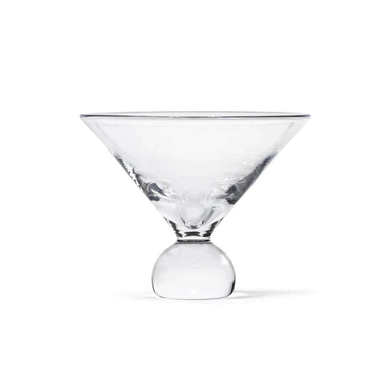 Clear martini glass with wide triangular bowl and bulbous stem base on white background.