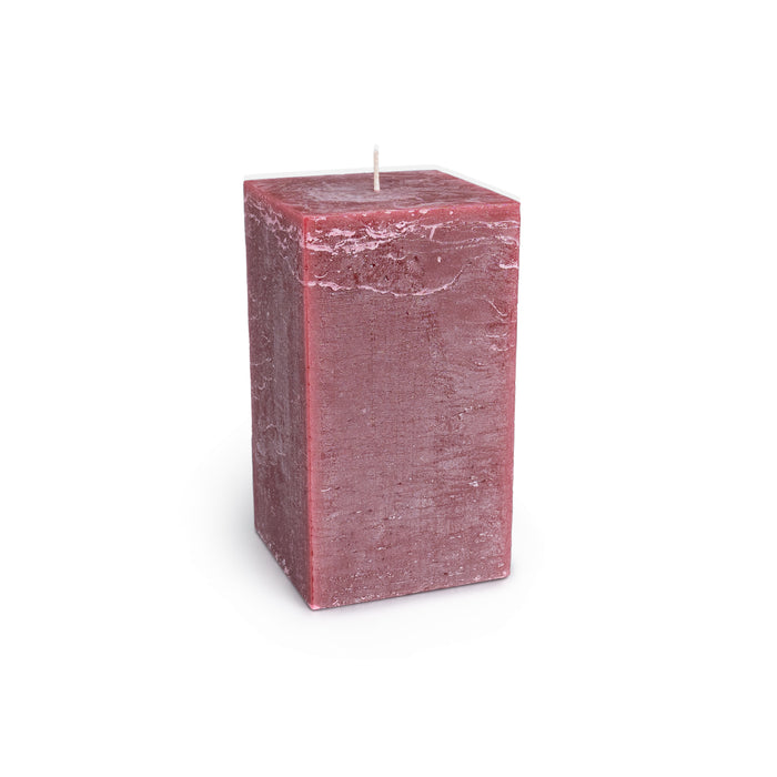 Deep berry-colored square pillar candle with white wick and textured wax surface.