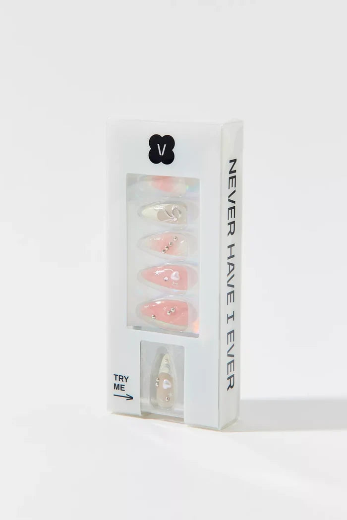 Black Friday Gift Set with pink and white press-on nails featuring pearl and heart accents, includes tooth gem kit.