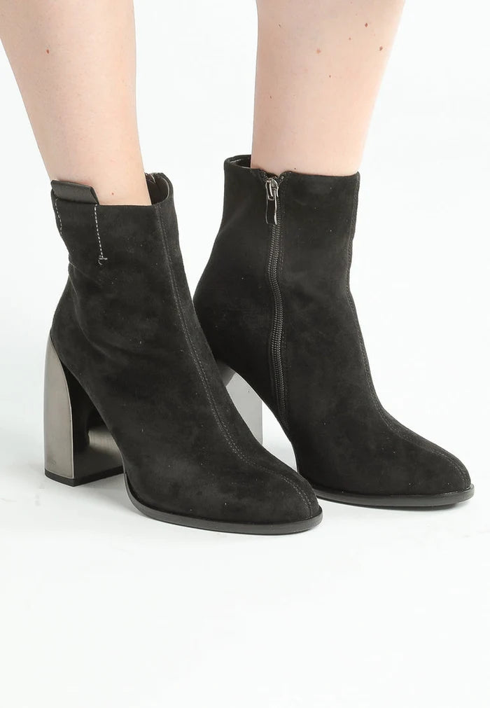 A pair of stylish black suede ankle boots with a trendy square heel for women's fashion.
