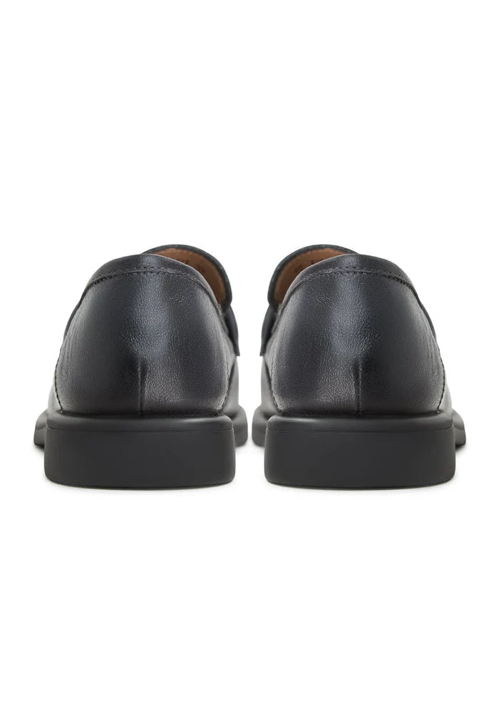 A stylish pair of Stephanie grey block heeled loafers, perfect for women looking for chic and comfortable slip-on shoes from the Stephanie brand.