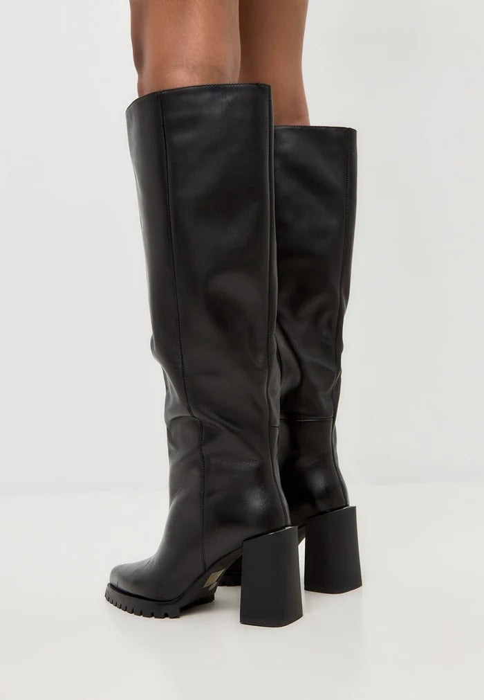 A pair of fashionable women's knee-high boots in bold black color, featuring a chic block heel design.