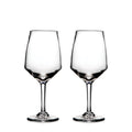 Two clear wine glasses with tapered bowls and stems on a white background.