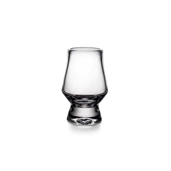 Clear glass tasting glass with tapered bowl and bulbous base on white background.