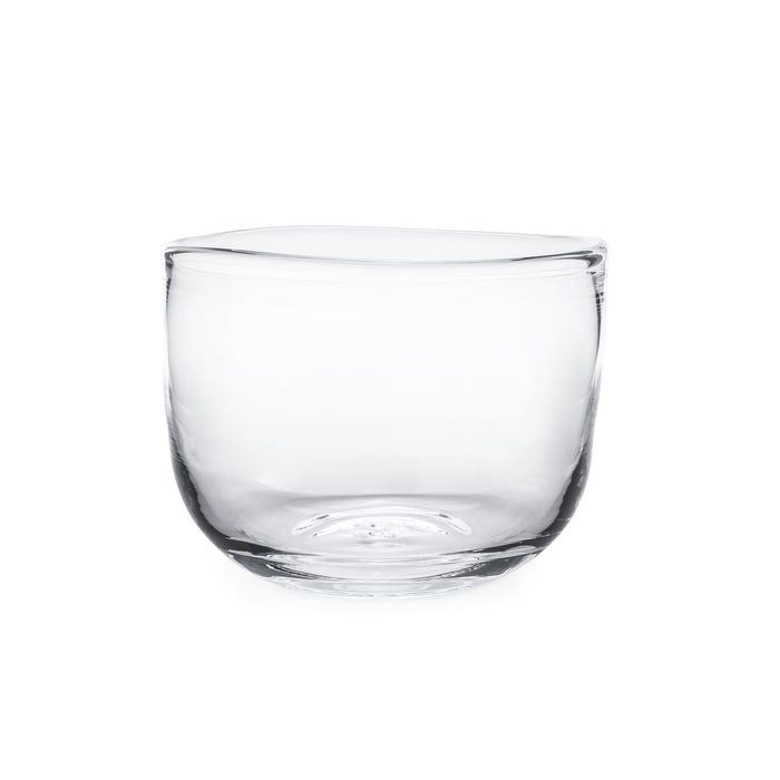 Clear glass bowl with wide rounded sides and flat bottom.