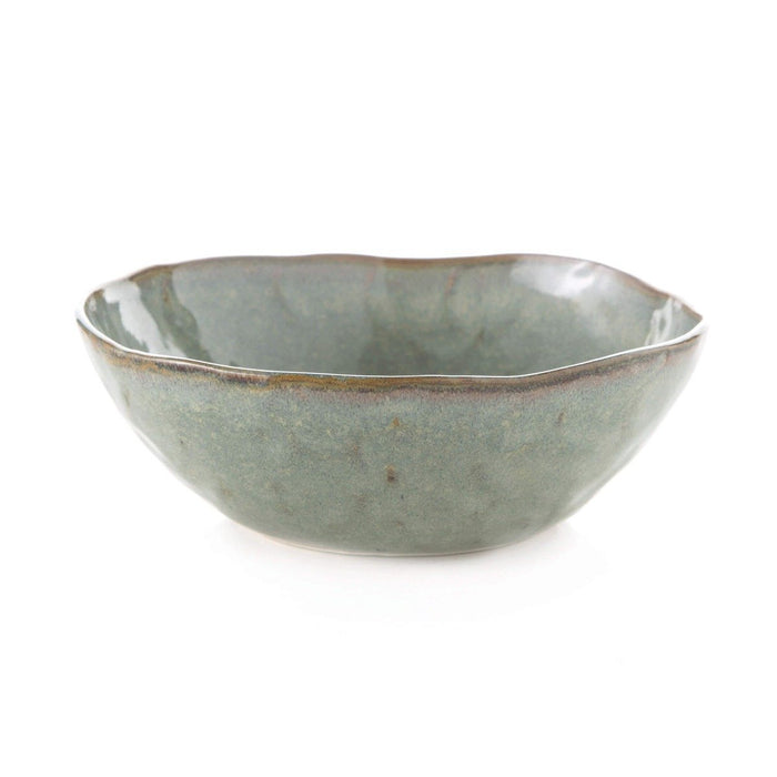 Moss green cereal bowl with wavy rim and speckled glaze finish.