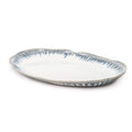 Oval ceramic platter with blue brushstroke pattern on white background and rim.