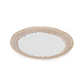 Beige ceramic side plate with white center and textured rim edge.