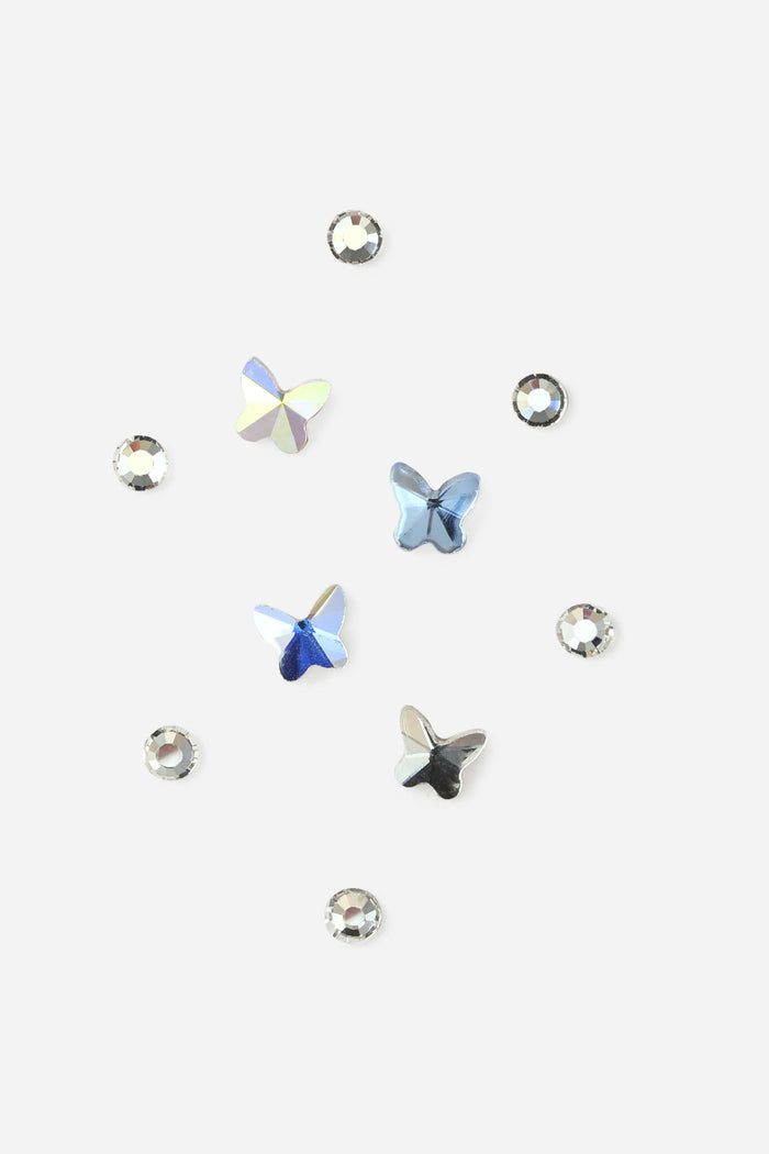 Butterfly Glam DIY Tooth Gem Kit features iridescent butterfly-shaped crystals and round clear rhinestones.