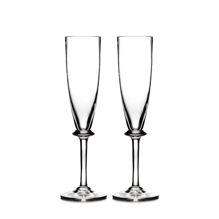 Two clear glass champagne flutes with tapered bowls and pedestal stems on square bases.