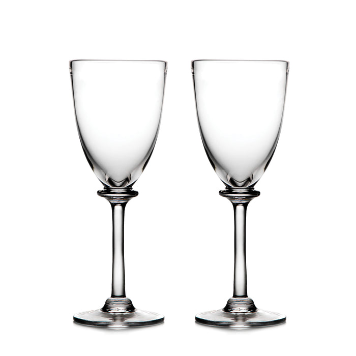 Two clear wine glasses with long stems and rounded bowls on white background.