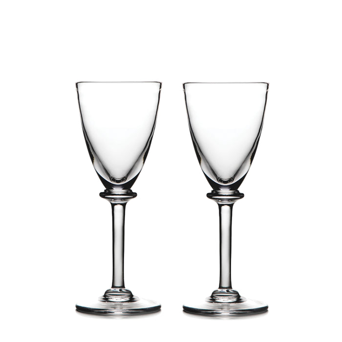 Two clear glass wine glasses with tapered bowls and stem bases on white background.
