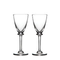 Two clear glass wine glasses with tapered bowls and stem bases on white background.