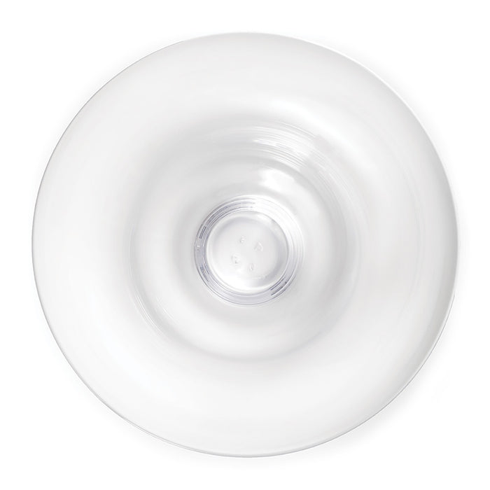 White round bowl with concentric circular design and centered circular well, viewed from above.