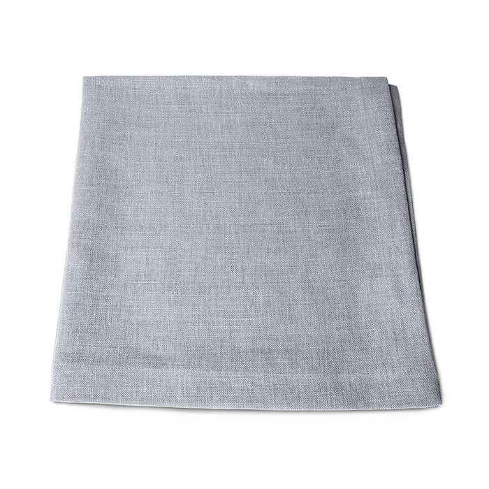 Four light gray linen napkins stacked and folded.