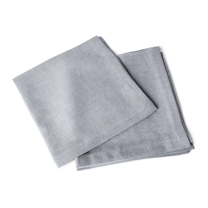 Two folded gray linen napkins with woven texture displayed on white background.
