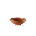 Cherry wood bowl with smooth, curved sides and a light-colored rim on a white background.