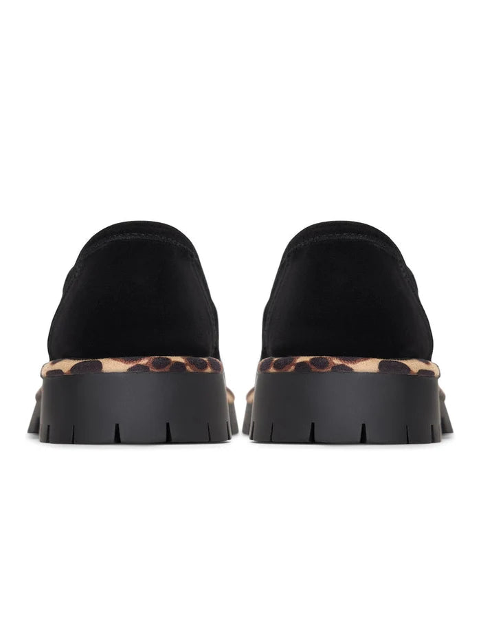 A trendy pair of chunky sole loafers in chic black, known as Lily black loafers - fashionable and stylish footwear option.