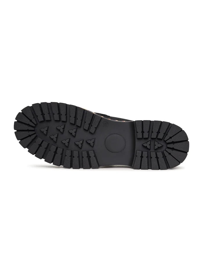 A pair of chic black loafers with chunky soles, known as Lily black loafers, the perfect combination of style and comfort in fashionable chunky sole footwear.