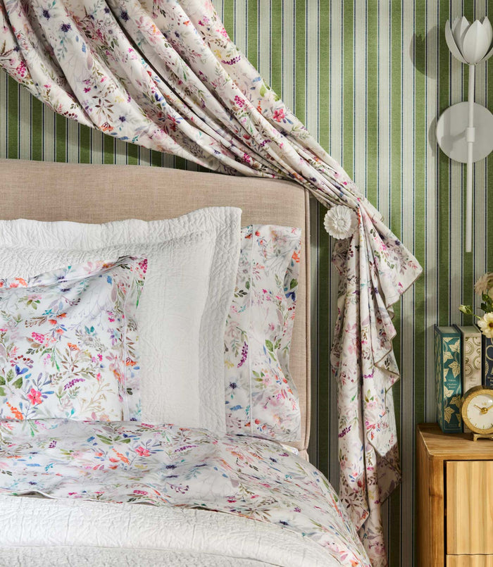 Chloe sheet set on bed with matching floral and white bedding, Floral