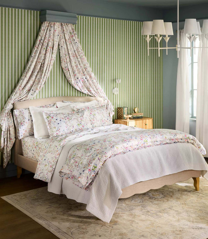 Chloe sheet set on bed in green room, Floral