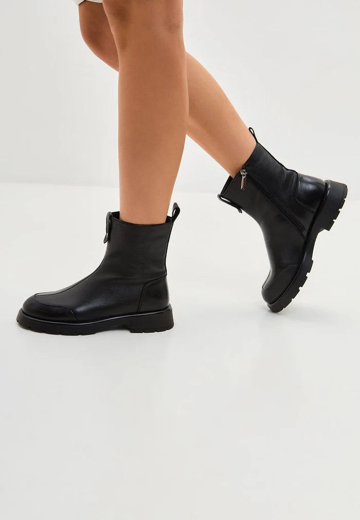 A cozy pair of Chunky Ankle Boots - the Wool Penelope in classic Black, a must-have for women's winter fashion.